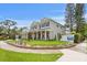 Attractive two-story house with a manicured lawn, landscaped beds, and sidewalks at 4536 W Swann Ave, Tampa, FL 33629