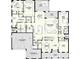 Detailed floor plan showcasing the layout of the first floor, including living spaces, kitchen, and garage at 4536 W Swann Ave, Tampa, FL 33629