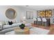 Cozy living room featuring a wet bar with marble countertops and stylish contemporary decor at 4536 W Swann Ave, Tampa, FL 33629