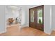 Inviting office space with wood floors, natural light, and a view through glass paneled double doors at 4536 W Swann Ave, Tampa, FL 33629