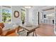 Bright office space featuring hardwood floors, white walls, natural light, and modern decor at 4536 W Swann Ave, Tampa, FL 33629