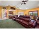 Gathering room with a wet bar and leather seating at 1299 Coverstone Ct, Oldsmar, FL 34677