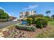 Condo building with landscaping and parking at 6218 Palma Del Mar S Blvd # 606, St Petersburg, FL 33715