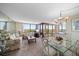 Bright living room with bay windows and dining area at 6218 Palma Del Mar S Blvd # 606, St Petersburg, FL 33715