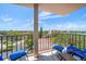 Relaxing balcony with patio furniture and water views at 6218 Palma Del Mar S Blvd # 606, St Petersburg, FL 33715