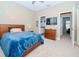 Bedroom with a double bed, dresser, and en-suite bathroom at 3108 Toscana Cir, Tampa, FL 33611