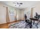 Bedroom with hardwood floors and neutral walls at 205 Se Monroe N Cir, St Petersburg, FL 33703