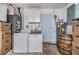 Laundry room with washer, dryer, and storage cabinets at 205 Se Monroe N Cir, St Petersburg, FL 33703