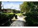 Outdoor seating area with picnic tables at 36121 Lake Chase Blvd # 204, Zephyrhills, FL 33541