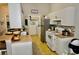 Galley kitchen with stainless steel appliances and ample counter space at 36121 Lake Chase Blvd # 204, Zephyrhills, FL 33541