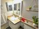 Bright bathroom with updated vanity and fixtures at 36121 Lake Chase Blvd # 204, Zephyrhills, FL 33541