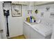Convenient laundry room with washer and dryer at 36121 Lake Chase Blvd # 204, Zephyrhills, FL 33541