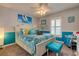 Bright bedroom with white bed and coastal decor at 11426 Glenmont Dr, Tampa, FL 33635