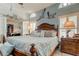 Main bedroom with king bed and access to private sitting area at 11426 Glenmont Dr, Tampa, FL 33635