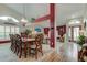 Spacious dining room with a large wooden table and chairs, perfect for Gathering gatherings at 11426 Glenmont Dr, Tampa, FL 33635