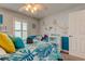 Bedroom with coastal decor and a full bed at 11426 Glenmont Dr, Tampa, FL 33635