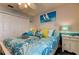 Bedroom with white bed and coastal decor at 11426 Glenmont Dr, Tampa, FL 33635