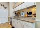 Kitchen boasts granite countertops and stainless steel appliances at 11426 Glenmont Dr, Tampa, FL 33635