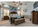 Main bedroom with a king-size bed and coastal decor at 11426 Glenmont Dr, Tampa, FL 33635