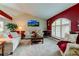 Spacious living room with comfortable sofas and large window at 11426 Glenmont Dr, Tampa, FL 33635