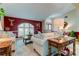 Bright living room with hardwood floors and an accent wall at 11426 Glenmont Dr, Tampa, FL 33635
