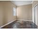 Simple bedroom with neutral walls and tile floors at 3127 W Sligh Ave # 104B, Tampa, FL 33614