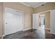 Spacious bedroom with tile floors and double doors to closet at 3127 W Sligh Ave # 104B, Tampa, FL 33614