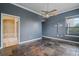 Bedroom with ensuite bathroom and slate tile floors at 3127 W Sligh Ave # 104B, Tampa, FL 33614