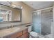 Updated bathroom with a walk-in shower and vanity at 3127 W Sligh Ave # 104B, Tampa, FL 33614