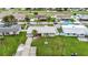 Aerial view of house with a pool and large backyard at 504 Florida S Cir, Apollo Beach, FL 33572