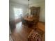 Cozy dining room featuring a wooden table, chandelier, and built-in china cabinet at 4313 Hollow Hill Dr, Tampa, FL 33624