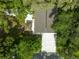 Overhead view of house, driveway, and surrounding trees at 1334 Fairmont St, Clearwater, FL 33755