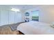 Comfortable bedroom with double closets and a TV at 12760 Indian Rocks Rd # 1004, Largo, FL 33774