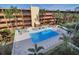 Complex pool and surrounding patio area from above at 12760 Indian Rocks Rd # 1004, Largo, FL 33774