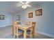 Dining area with table and chairs near kitchen at 12760 Indian Rocks Rd # 1004, Largo, FL 33774