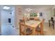 Dining area with wooden table and chairs at 12760 Indian Rocks Rd # 1004, Largo, FL 33774
