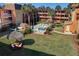 Relaxing spa and courtyard with a grassy area at 12760 Indian Rocks Rd # 1004, Largo, FL 33774