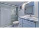 Clean bathroom with white vanity and a walk-in shower at 12760 Indian Rocks Rd # 1004, Largo, FL 33774