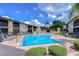 Inviting community swimming pool with ample deck space at 10100 Sailwinds N Blvd # 205, Largo, FL 33773