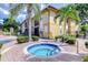 Relaxing hot tub area next to the community pool at 10100 Sailwinds N Blvd # 205, Largo, FL 33773
