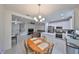 Kitchen and dining area with an open floor plan at 6378 Camino Dr, Apollo Beach, FL 33572