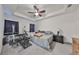 Spacious primary bedroom with carpeted floors and ceiling fan at 6378 Camino Dr, Apollo Beach, FL 33572
