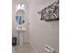 Clean and updated bathroom with pedestal sink at 6378 Camino Dr, Apollo Beach, FL 33572