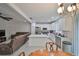Modern kitchen with stainless steel appliances and an island at 6378 Camino Dr, Apollo Beach, FL 33572