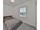 Bedroom with double bed and window with blinds at 6378 Camino Dr, Apollo Beach, FL 33572