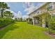 Spacious backyard with grassy area at 6378 Camino Dr, Apollo Beach, FL 33572