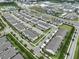 Aerial view of community featuring numerous townhouses at 6378 Camino Dr, Apollo Beach, FL 33572