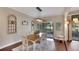 Farmhouse style dining room with wood table and seating for six at 103 Capri N Ct, Plant City, FL 33566