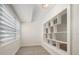 Bright room with a window and decorative built-in shelves at 6750 W Flamingo S Way, St Petersburg, FL 33707