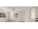 Bedroom with a ceiling fan and a door to the patio at 6750 W Flamingo S Way, St Petersburg, FL 33707